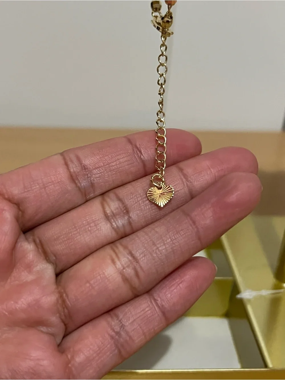 Gold Heart Bracelet with Crystal Accents and Flower Links
